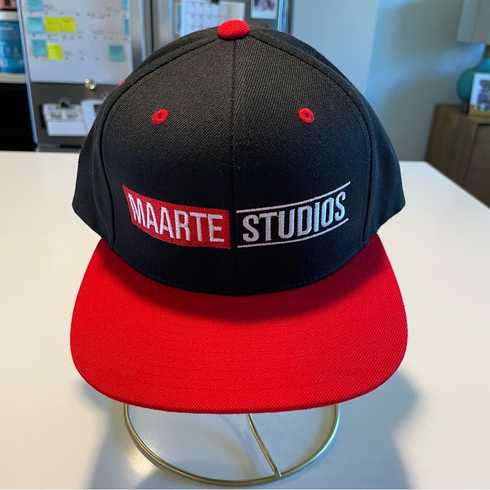 YUPOONG - “Maarte Studios” SnapBack Hat, Black and Red